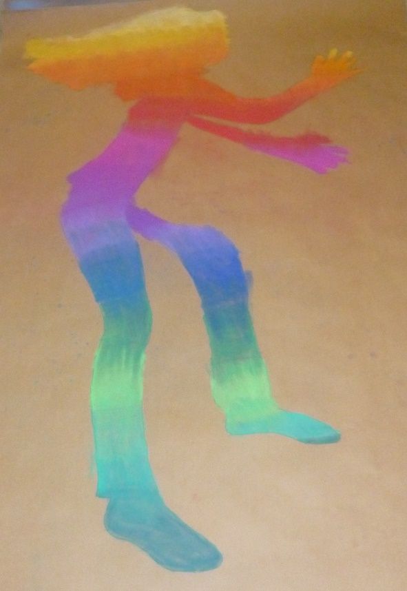 Silhouette dansante peinte aux couleurs de l'arc-en-ciel